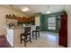 Eat-in kitchen with breakfast bar and stainless steel appliances at 15429 Green Jay Rd, Weeki Wachee, FL 34614