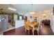Open-concept living space seamlessly connects kitchen, dining area, and living room at 15429 Green Jay Rd, Weeki Wachee, FL 34614