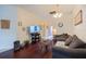 Comfortable living area featuring hardwood floors and casual furniture at 15429 Green Jay Rd, Weeki Wachee, FL 34614