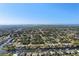 Expansive aerial perspective showcasing the tranquil waterways and coastal landscape at 18350 Burkholder Cir, Port Charlotte, FL 33948