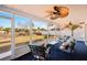 Enclosed patio featuring comfortable seating and scenic views of the surrounding landscape at 18350 Burkholder Cir, Port Charlotte, FL 33948