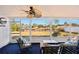 Enclosed patio featuring comfortable seating and scenic views of the surrounding landscape at 18350 Burkholder Cir, Port Charlotte, FL 33948