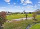 Aerial view of the community's verdant landscaping with streams and ponds at 2280 World Parkway Blvd # 34, Clearwater, FL 33763
