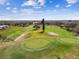 Aerial view of the community's well-maintained green with mature trees at 2280 World Parkway Blvd # 34, Clearwater, FL 33763