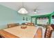 A dining area featuring tile flooring and a view to the Gathering room at 2280 World Parkway Blvd # 34, Clearwater, FL 33763