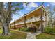 Inviting condo building featuring charming architectural details, perfect for comfortable living at 2280 World Parkway Blvd # 34, Clearwater, FL 33763
