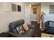 Hallway has couches and decorative wall hangings at 249 Iron Age St., Safety Harbor, FL 34695