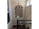 Hallway has a tiled wall and a wrought-iron fence at 249 Iron Age St., Safety Harbor, FL 34695