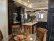 Bright kitchen featuring stainless steel appliances and dark wood cabinets with an open layout at 249 Iron Age St., Safety Harbor, FL 34695