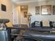 A living room with leather couches, lamps and hanging decorations at 249 Iron Age St., Safety Harbor, FL 34695
