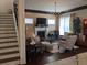 The living room has a fireplace, hardwood floors, and large bright windows at 249 Iron Age St., Safety Harbor, FL 34695