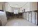 Bright kitchen with ample cabinet space, ready for updates and personalization at 2491 Coronado Way, Dunedin, FL 34698