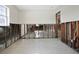 Spacious living room with partially removed walls and a light colored tile floor at 2491 Coronado Way, Dunedin, FL 34698