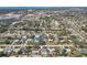 Aerial view of a neighborhood with many single Gathering homes, businesses, and mature trees at 2851 66Th N Way, St Petersburg, FL 33710