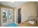 Featuring a sliding door with a granite countertop and view to the outside, offering a tranquil living experience at 2851 66Th N Way, St Petersburg, FL 33710