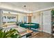 Bright dining area features a built-in bench seat, decorative lighting, and an open layout to the living room at 2851 66Th N Way, St Petersburg, FL 33710