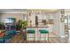 Modern kitchen featuring an eat-in bar, ample storage, and stainless steel appliances at 2851 66Th N Way, St Petersburg, FL 33710