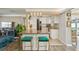 Contemporary kitchen with an eat-in island, sleek cabinetry, and stainless steel appliances at 2851 66Th N Way, St Petersburg, FL 33710