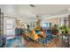 Comfortable living area with hardwood floors, stylish furnishings, and ample natural light at 2851 66Th N Way, St Petersburg, FL 33710