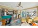 Bright living room with open floor plan and backyard views with a pool offering seamless indoor-outdoor living at 2851 66Th N Way, St Petersburg, FL 33710