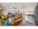 Spacious living area with hardwood floors and an abundance of natural light at 2851 66Th N Way, St Petersburg, FL 33710