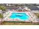 Birds eye shot of the community pool showcasing the unique design and surrounding amenities at 29523 Waggle Dr, San Antonio, FL 33576