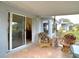 Cozy lanai features comfortable seating and access to the outdoors at 29523 Waggle Dr, San Antonio, FL 33576