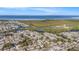 Aerial view of the community with nearby canal and ocean at 3624 Wiltshire Dr, Holiday, FL 34691