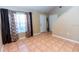 Bright entryway featuring tile floor, lots of light, and neutral wall color at 3673 Kings Rd # 102, Palm Harbor, FL 34685