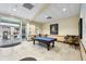 Enjoy a friendly game of pool in the community's game room with a billiards table at 3673 Kings Rd # 102, Palm Harbor, FL 34685