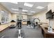 Fully equipped gym with a variety of machines for a complete workout at 3673 Kings Rd # 102, Palm Harbor, FL 34685