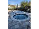 Relax and unwind in the community hot tub, featuring a paver patio at 3673 Kings Rd # 102, Palm Harbor, FL 34685