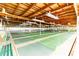 Indoor shuffleboard courts provide a great recreational space, featuring bright lighting and ample seating at 37150 Sandra Ave, Zephyrhills, FL 33542