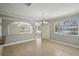 Bright dining area with neutral tones, tile floors, and an open layout at 4101 W Leila Ave, Tampa, FL 33616