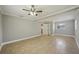 Spacious living room featuring neutral walls, tile floors, and recessed lighting at 4101 W Leila Ave, Tampa, FL 33616