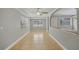 Bright living room with tile flooring, neutral walls, and ample natural light at 4101 W Leila Ave, Tampa, FL 33616