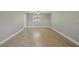 Bright living room with tile flooring, neutral walls, and ceiling fan at 4101 W Leila Ave, Tampa, FL 33616