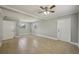 Spacious living room featuring neutral walls, tile floors, and recessed lighting at 4101 W Leila Ave, Tampa, FL 33616