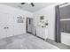 Serene bedroom with white dresser, natural light, and neutral decor at 4221 W Spruce St # 1325, Tampa, FL 33607