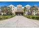 Attractive multi-story building with covered driveway access and well-maintained landscaping at 4221 W Spruce St # 1325, Tampa, FL 33607
