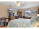 Cozy bedroom with warm tones, wood accents, and ample storage, creating a peaceful and inviting atmosphere at 4553 Kirkland Ave, Spring Hill, FL 34606