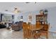 A beautiful view of the living room and dining room with natural light streaming in at 4553 Kirkland Ave, Spring Hill, FL 34606