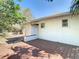 Backyard view of the wood patio, attached to the home's exterior, offering a nice outdoor space at 4604 Courtland St, Tampa, FL 33610