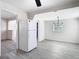Dining area featuring modern lighting and access to the kitchen offers a cozy spot for Gathering and friends gatherings at 4604 Courtland St, Tampa, FL 33610
