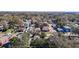 Aerial view of the neighborhood showcasing the home's location within a residential area with mature trees at 4604 Courtland St, Tampa, FL 33610