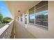 Long exterior corridor with multiple windows and entrances to condos at 4915 Bay Ne St # 322, St Petersburg, FL 33703