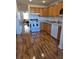 Clean kitchen with wood cabinets, granite countertops and modern appliances at 4915 Bay Ne St # 322, St Petersburg, FL 33703