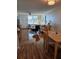 Comfortable living and dining area featuring wood floors and ceiling fan at 4915 Bay Ne St # 322, St Petersburg, FL 33703