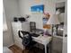 Home office with a desk, chair, storage, and decor at 4915 Bay Ne St # 322, St Petersburg, FL 33703