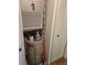 Utility closet with A.O. Smith ProMax water heater and easy access to the home's air filter at 4915 Bay Ne St # 322, St Petersburg, FL 33703